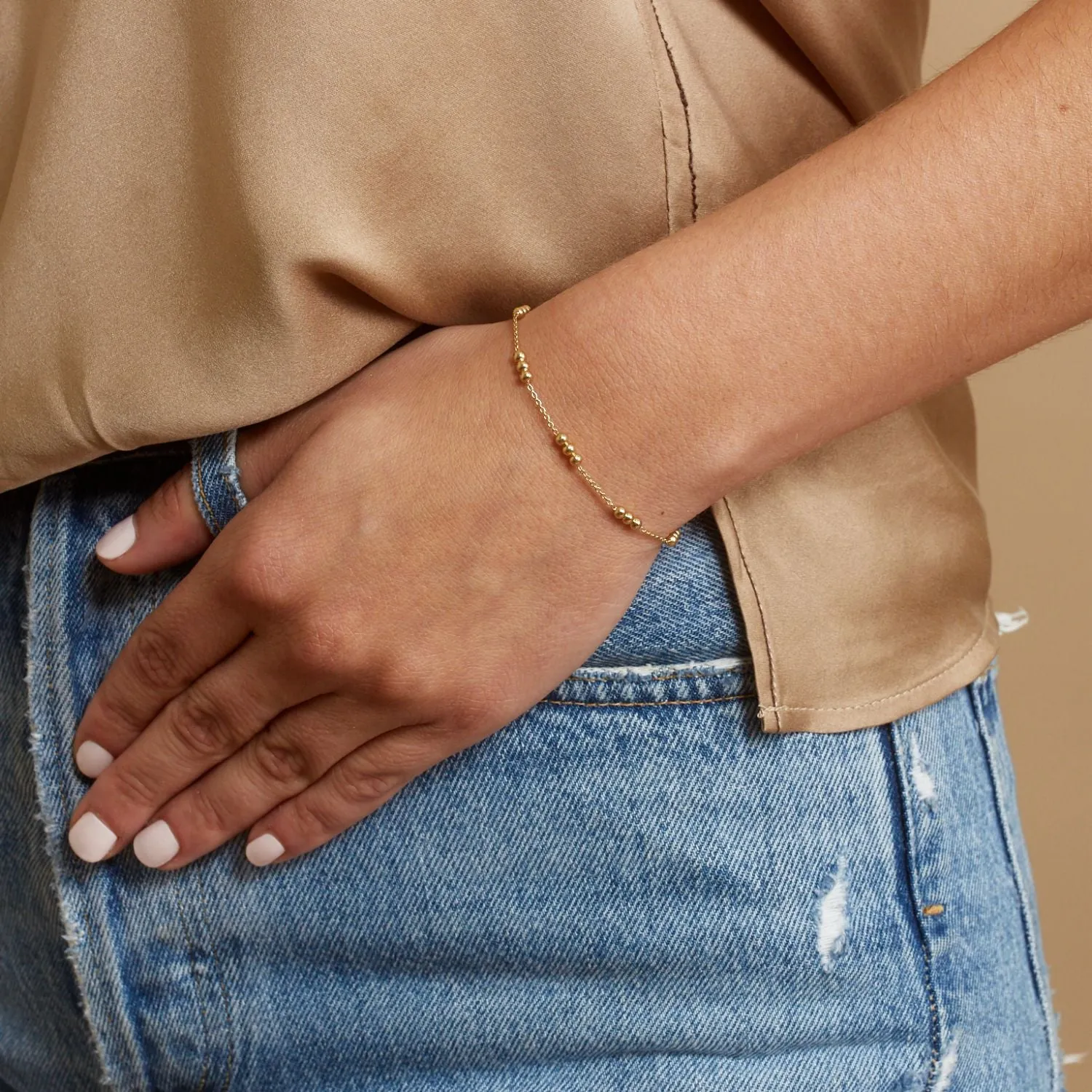 Dainty Triple Gold Bead Bracelet