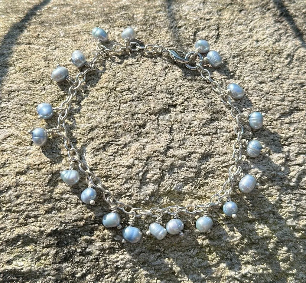 Icy blue pearl charm bracelet