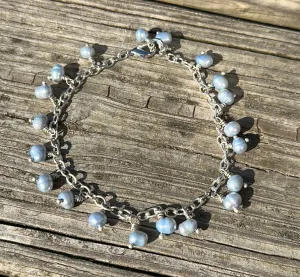 Icy blue pearl charm bracelet