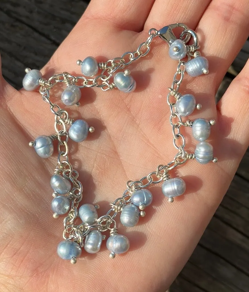 Icy blue pearl charm bracelet