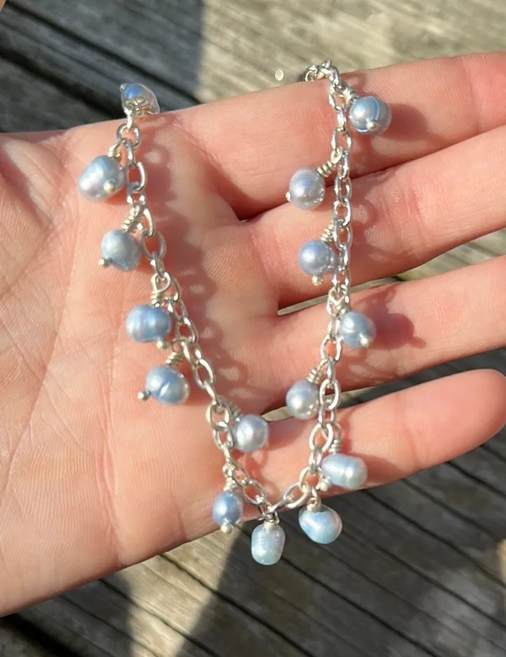Icy blue pearl charm bracelet